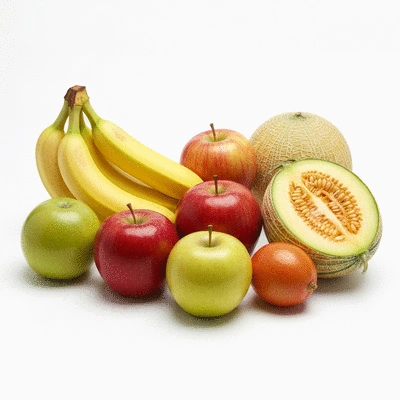 Assortment of GERD-friendly fruits like bananas, apples, and melons on a clean white background